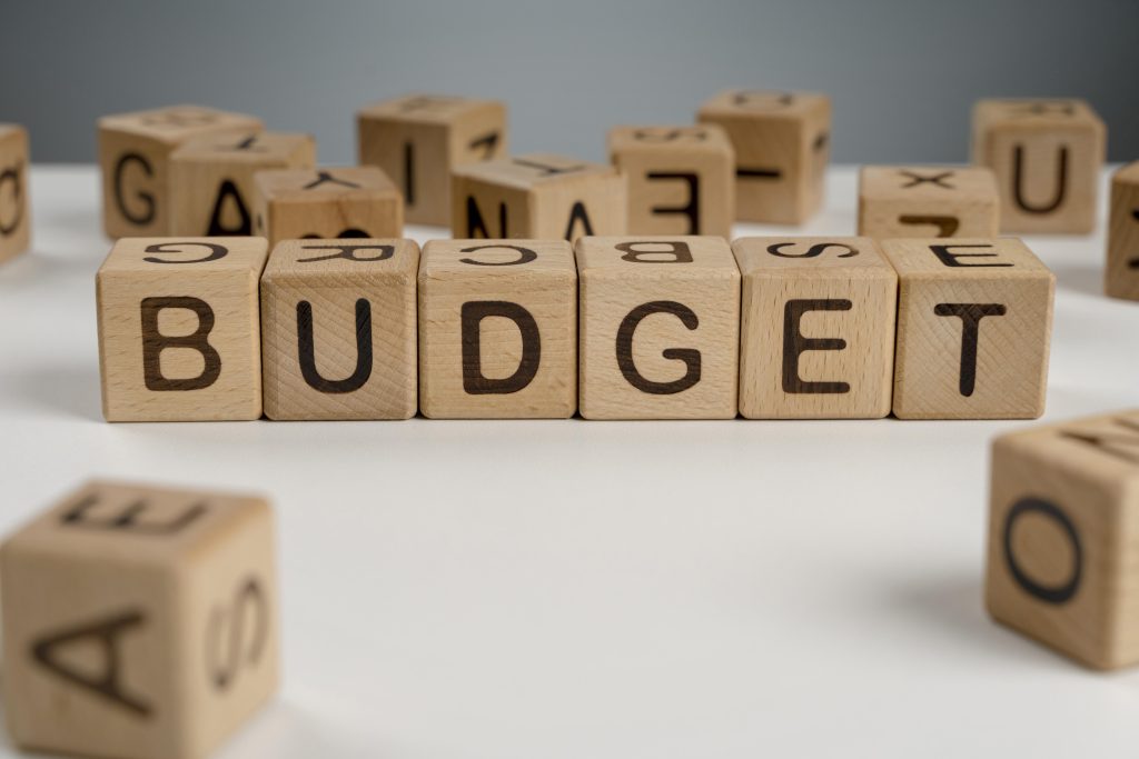 A scramble letters displaying the word BUDGET